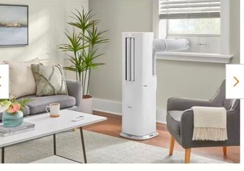 BRAND NEW IN BOX PORYABLE AIR CONDITIONER WITH HEATER