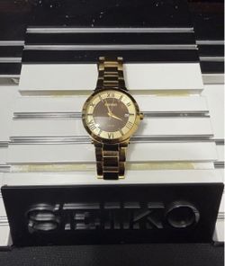 NEW Seiko SNE884 Solar Gold Tone Brown Dial Roman Date Watch 38mm