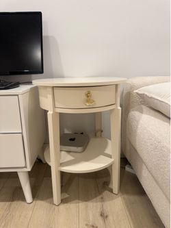 Round white wood nightstand