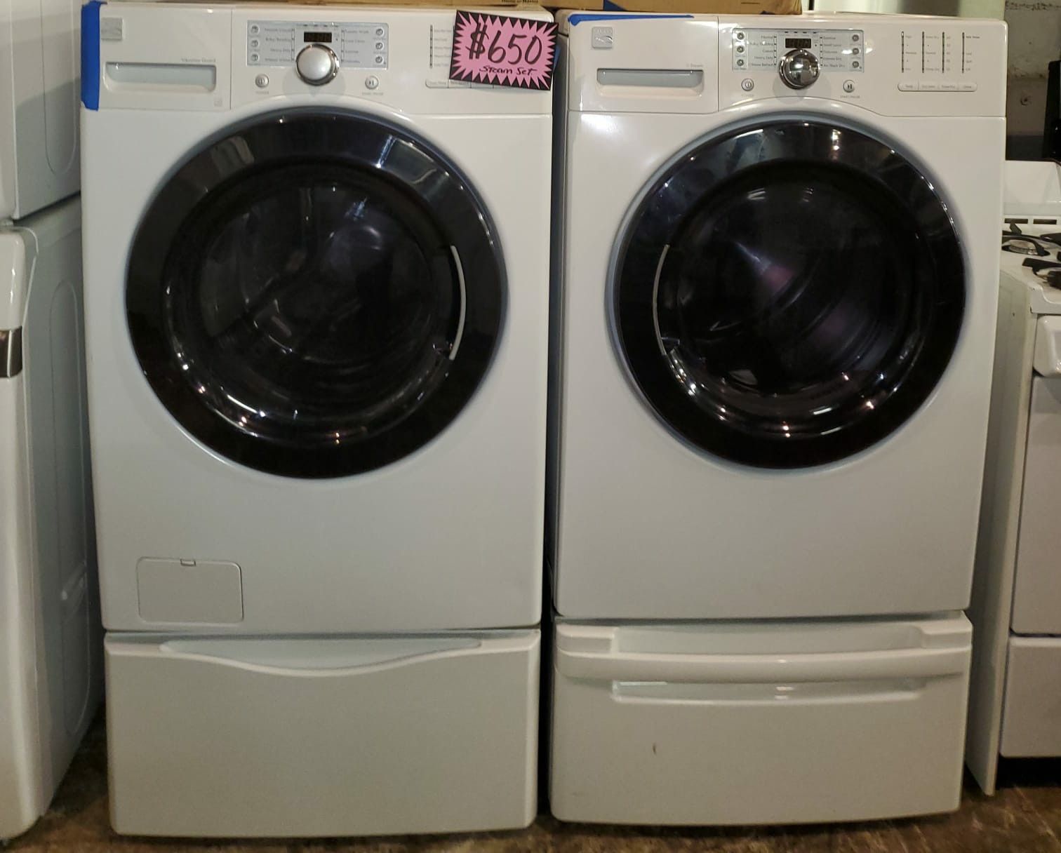 Kenmore front load washer and dryer set with pedestal working perfectly 4 months warranty