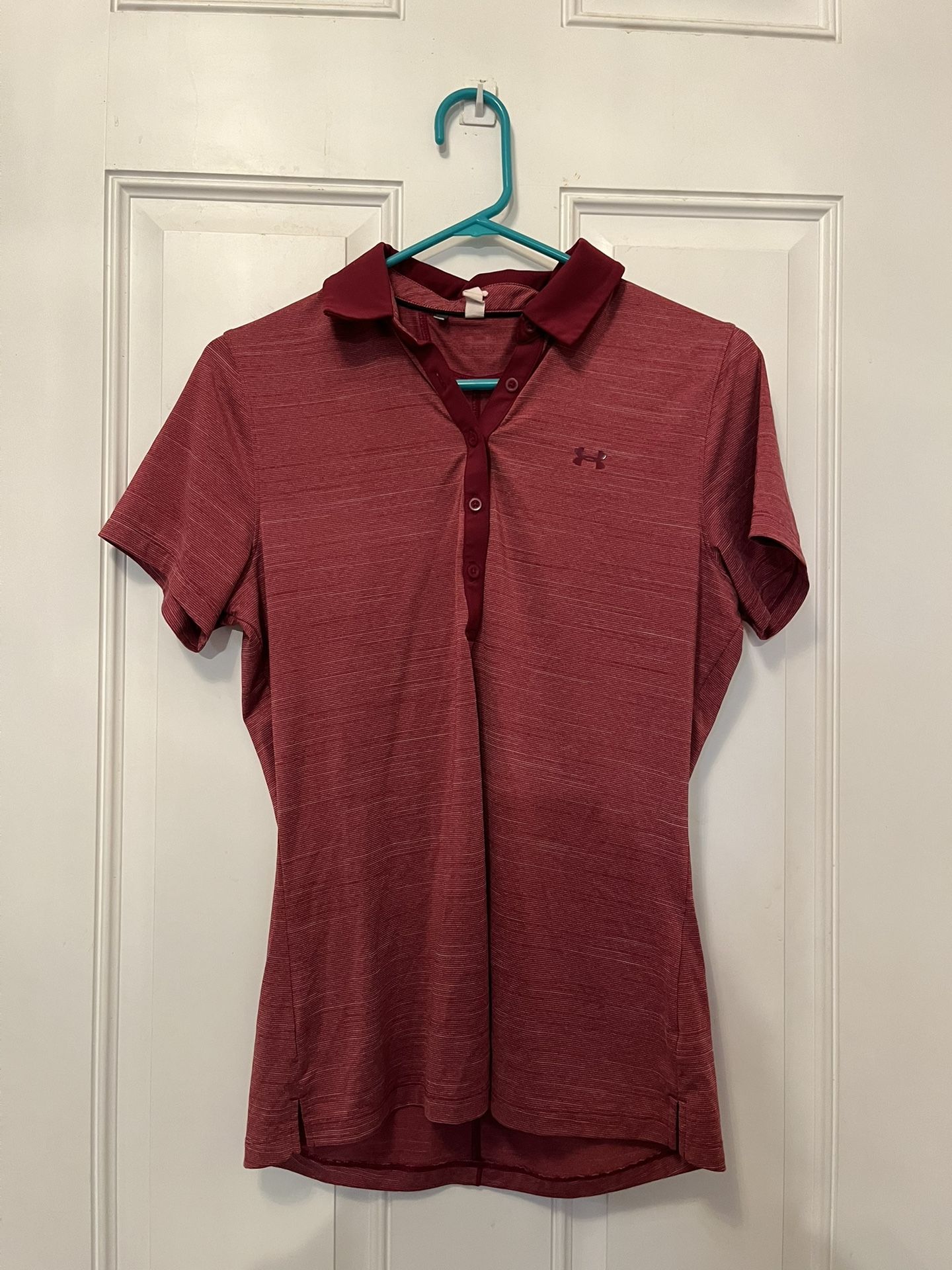 Woman’s Under Armor Tennis/golf Shirt Size Medium. Excellent condition