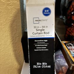 Curtain Rod And Burgundy Curtains 