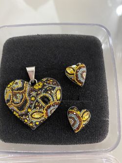 Silver yellow and black heart pendant set