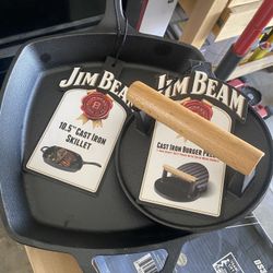 Jim Beam 10.5" cast iron skillet and a Jim Beam cast iron burger press. 