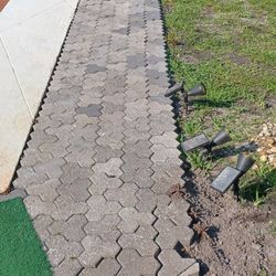 Gray,  interlocking. paving, stones: