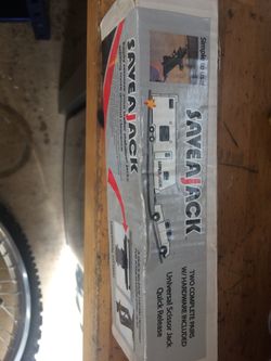 Camper jack removal bracket