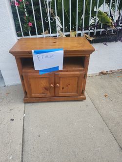 Has nicks and scratches but serves its purpose. Has wheels so easy to move
