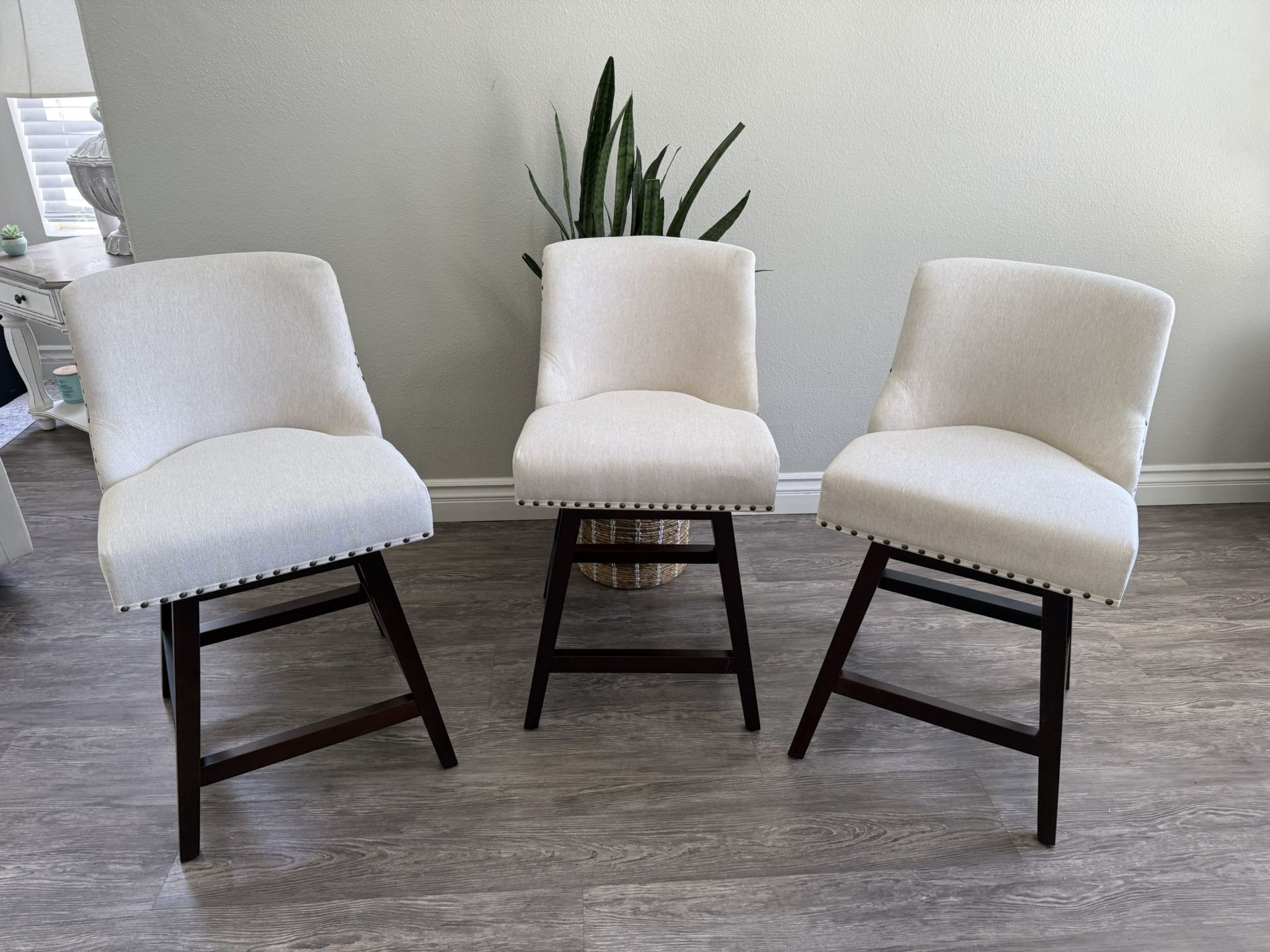 26 Inch Bar Stools Set of 3, Linen Color Swivel Counter Stools with Back, Linen Fabric Upholstered Barstools, Solid Wood Legs with Footrest, Modern Ba