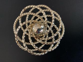 Gold finish brooch