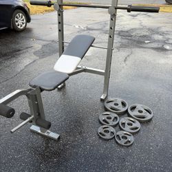 Bench Press With Olympic Bar And Weights 