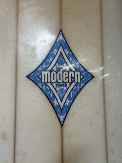 9-0 modern longboard at Catch a Wave Surf Shop