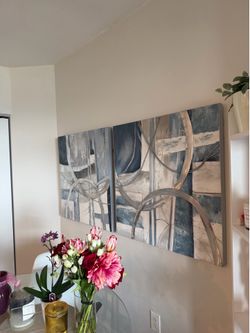 Two decorative wall art pieces