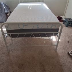 White Metal Twin Bed Frame. No Mattress  Missing A Bolt