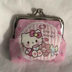 Hello Kitty coin purse live for yourself graphics with kiss lock closure.