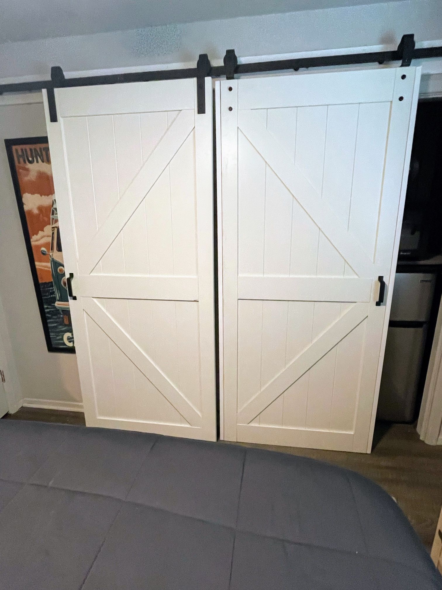 Sliding white barn doors