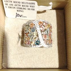 Beautiful Multi gemstone, Silver ring. with delicate hand work skilled setting.Timeless work of wearable art seamlessly blends 