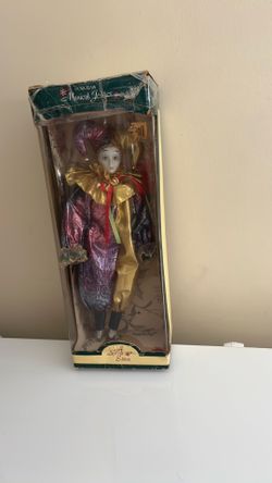 Collectible joker doll with musical box