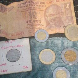 7 different parts of the world money  and a ..... 