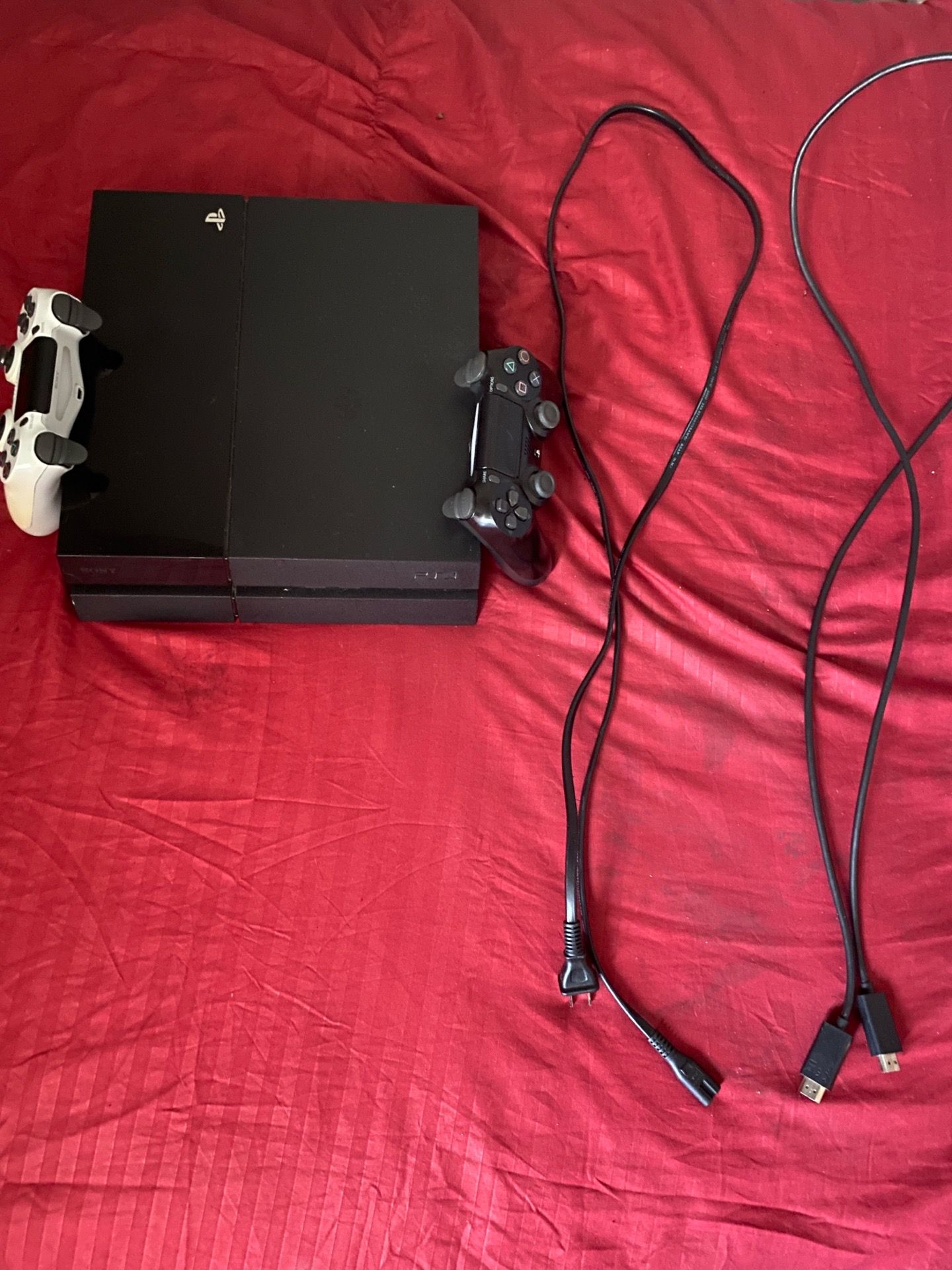PS4 with 2 controllers and game