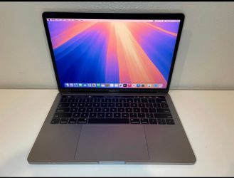 MacBook Pro 2020 256Ssd with Touch Bar screen (excellent condition)