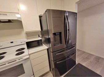 Samsung 4door refrigerator black stainless