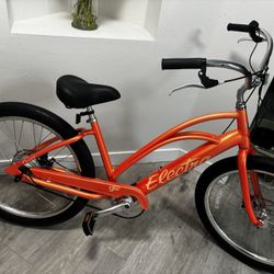 E-bike + Helmet | Electra Cruiser Go! Step-Thru US M – Coral Sunset | Electric Cruiser | New