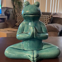 This Ceramic Yoga Frog Figurine is perfect for adding a sense of peace and tranquility to your home or garden decor. Featuring a serene, meditating fr
