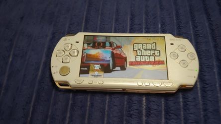 Psp game console 30gb memory 28 games in
Psp 2000