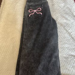 black washed pink bow jeans