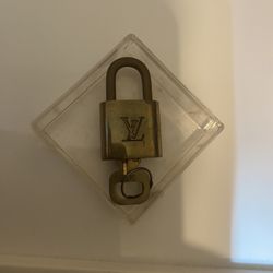 VINTAGE LOUIS VUITTON PODLOCK
