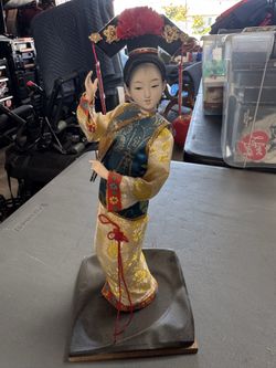 Vintage geisha doll