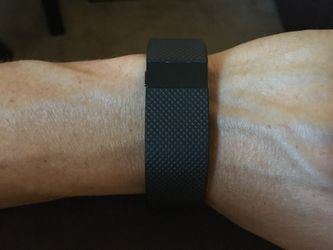 Fitbit Charge HR. Black. Small. Wear and tear with scratches from normal use. Works perfect. Comes with charger.