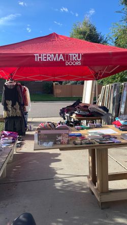 Yard sell  clothing, makeup, doors and windows look
