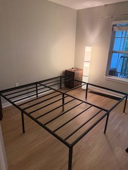King size metal bed frame /mattress support (all part available - photo shows it partially assembled)