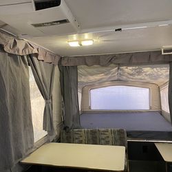 Popup camper with refrigerate air conditioner ,