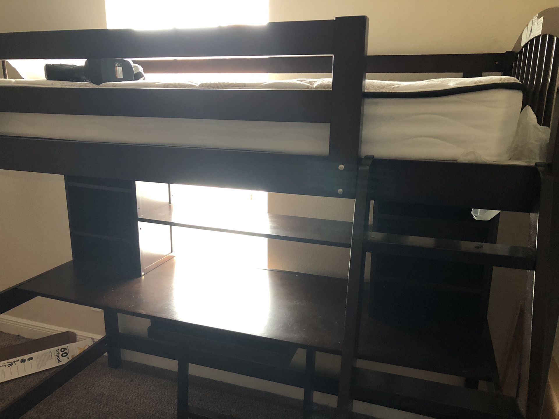 Kids loft bed with desk and bookshelves underneath. Cherry wood, will hold up to 175 lbs. Excellent condition! Must pickup.