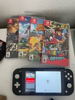 Nintendo Switch Lite + 4 Games 🎮