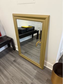 Large gold mirror