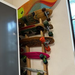 Various Skateboards And Skim Board