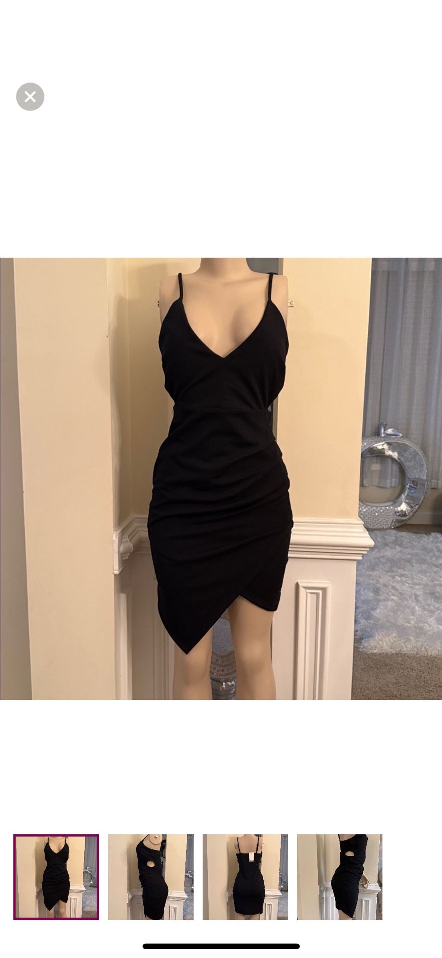 Elegant black sleeveless bodycon dress with a V-neckline. Perfect for a night out.