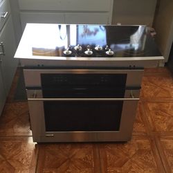 GE Profile Stovetop And GE Monogram Oven