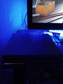 PlayStation 4 pro with 1 TB and controller and games
