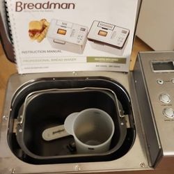 Bread Maker With Recipe Book.