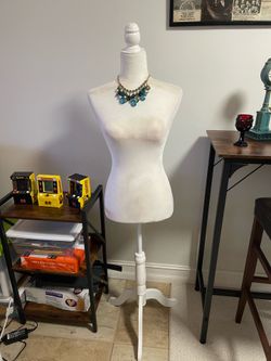 White Mannequin Torso on Wood Base