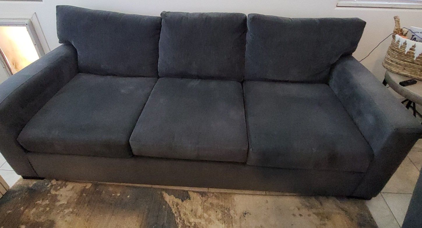 Mercer FOAM Living Spaces couches and swivel chairs