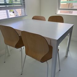 Dining table & chairs (wood)
