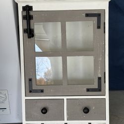 Farmhouse wood wall hanging cabinet with glass windows.