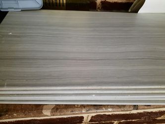 bathroom tile. 4 medium white and 5 large gray