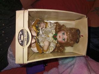 Unopened New Collectable Memories genuine  porcelain doll