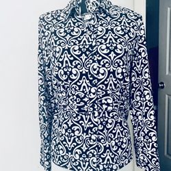 Black and white Large petite, 94% polyester, 5% spandex. Blouse. Long sleeve. Buttons grouped by twos. Delicate silver color shimmering lines. 